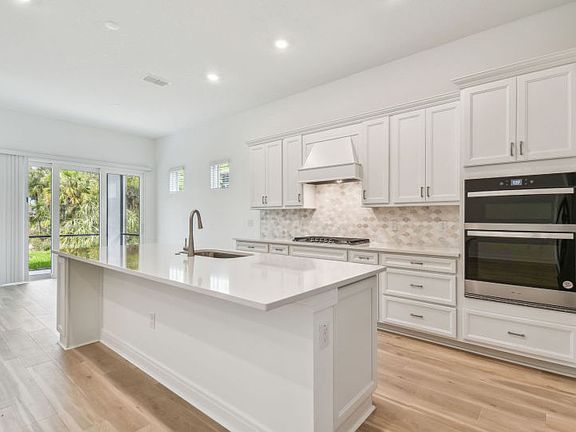 Spacious and Bright Kitchen in Model Representation