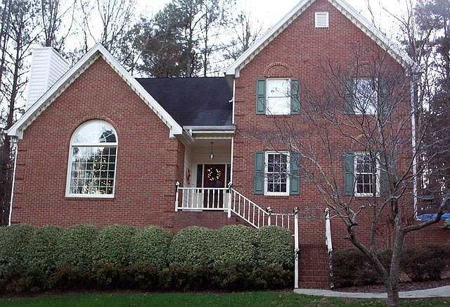 Outside of house/basement entrance to left