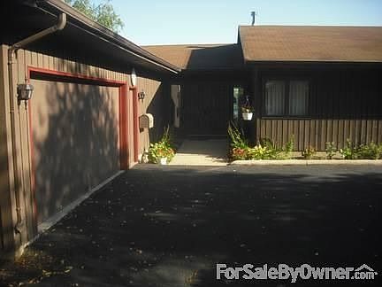 Front Door : This photo is taken from a very large parking area next to the garage