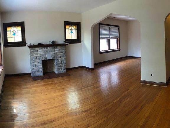 pano pic of front room, dining room and hallway facing north