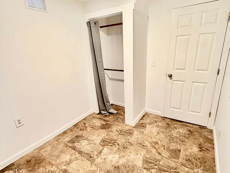 a bonus flex room (7.5' x 7.5') ideal for a home office, guest space, or extra storage.