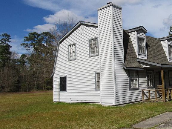 Back of property goes 100 ft past trees.
