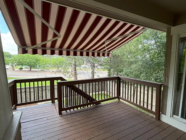 Deck with retractable awning