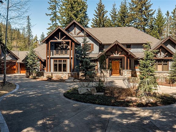 Front of the home showing the circular driveway and extra parking