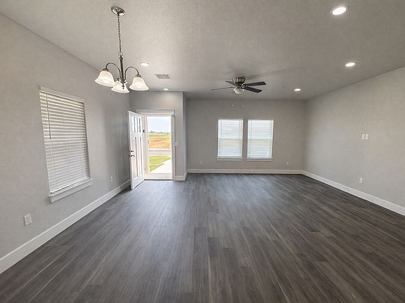 Spacious living area with 9-foot ceilings and abundant natural light.
