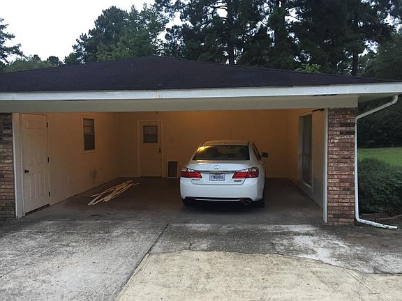 2 car carport with storage room