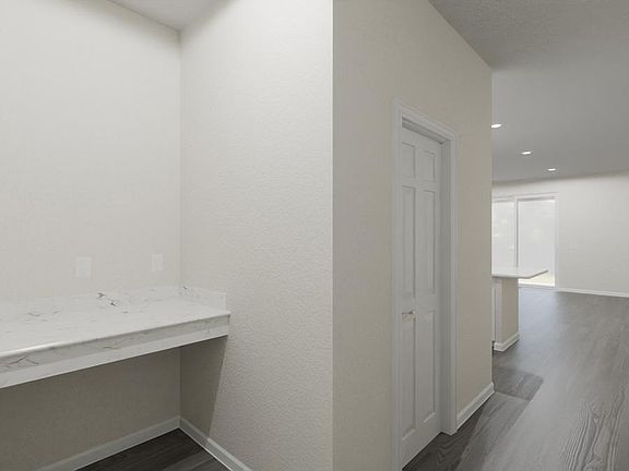 Thoughtful design is found throughout, such as this mudroom at the garage entry. Artist s rendering