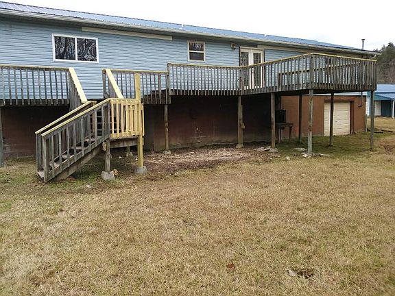 back , extensive decking, garage 2 unfinished basement