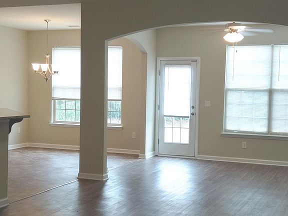 Open, bright living and dining areas