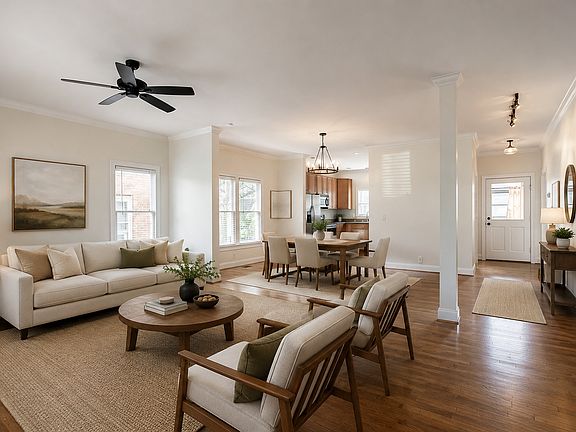 Large living and dining areas. Photos are virtually staged. Back door is to the screened in porch and yard.