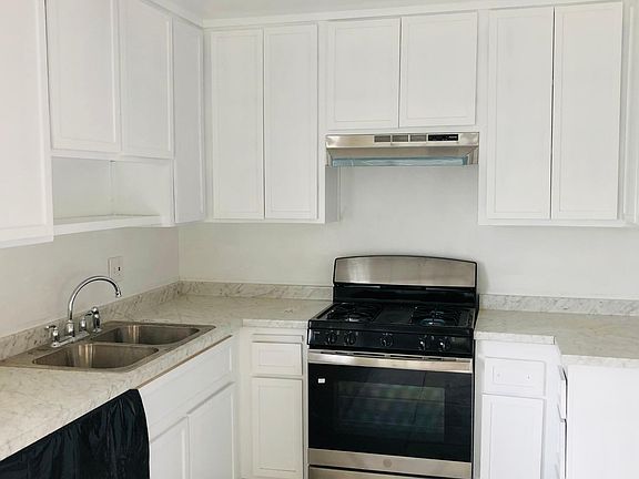 Kitchen- new range and dishwasher.