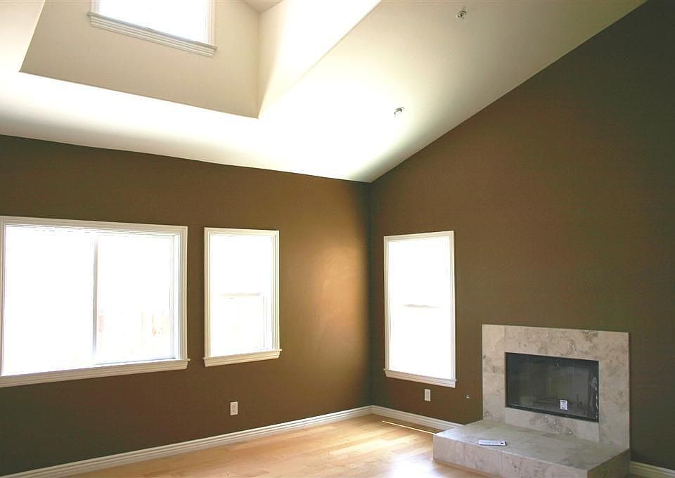 Living Room w/Cathedral Ceiling & Tile Fireplace