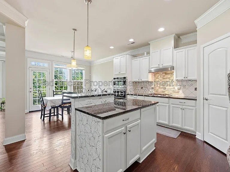 9659 Camberley Ave NW — Photo 18