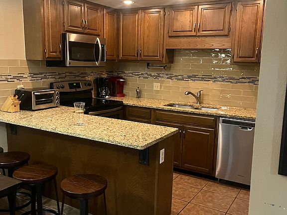 Beautiful kitchen with counter seating.