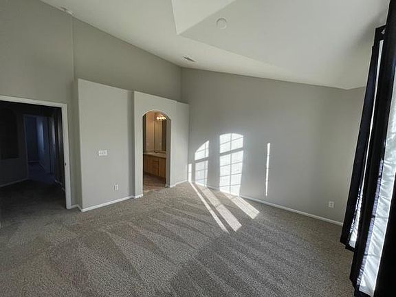 master bedroom with bathroom entrance