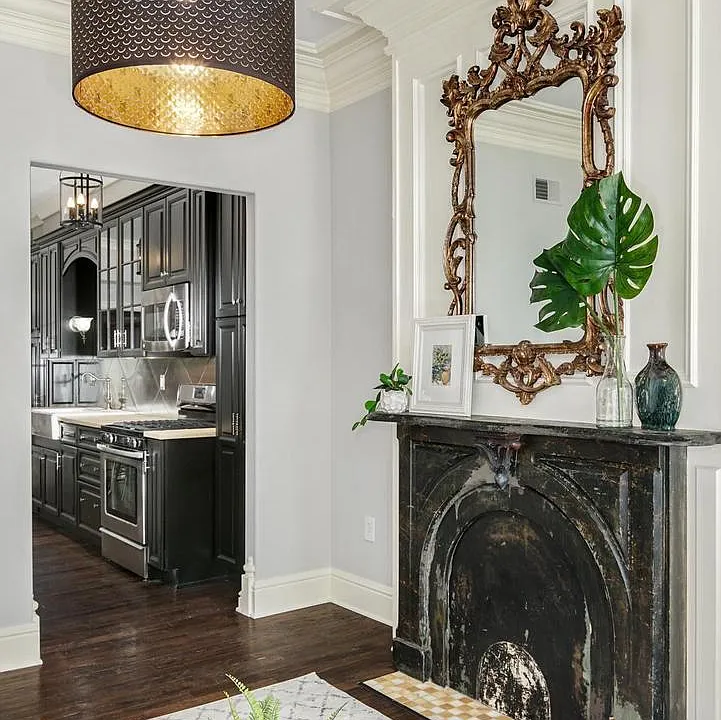 lots of character throughout home including original fireplace and mirror