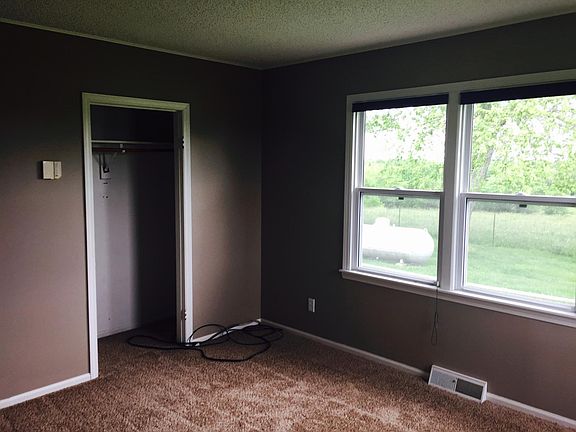 Master bedroom with carpet.