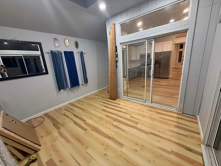Bonus room next to kitchen and Master bedroom- Door to backyard