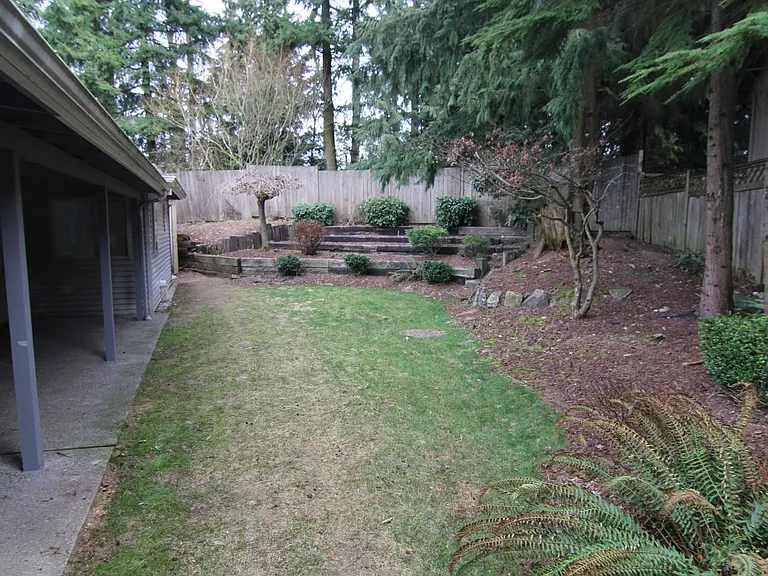 Private fully fenced backyard