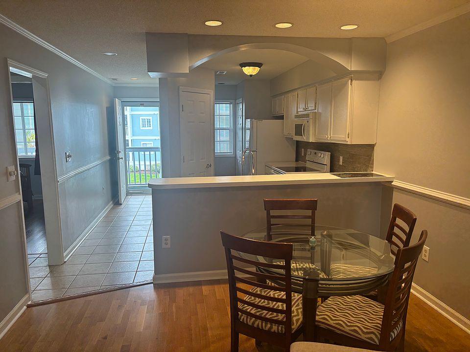 Dining Room view into Kitchen; table and (4) chairs included in rental