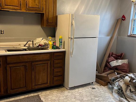 Forgive the mess! The kitchen is large with new flooring and paint.