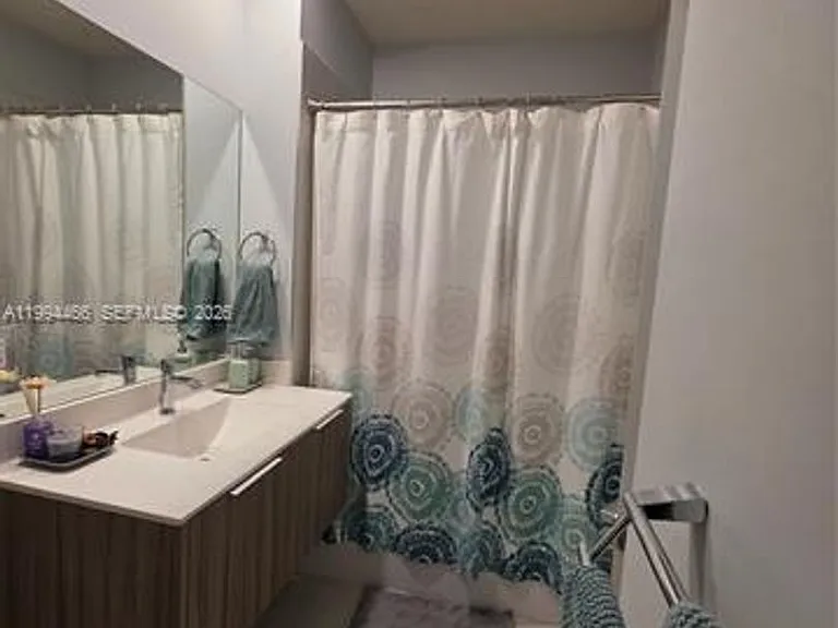 10222 NW 64th Way #302 — Photo 25