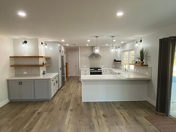 Large open kitchen has plenty of space to accommodate multiple cooks
