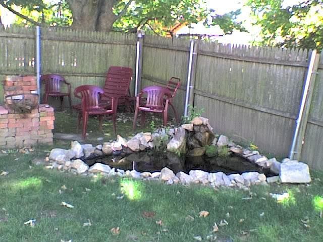 koi pond and fire place