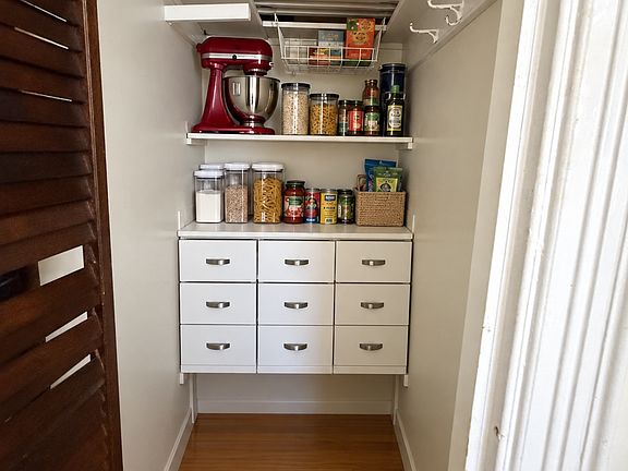Pantry off kitchen polished by AI