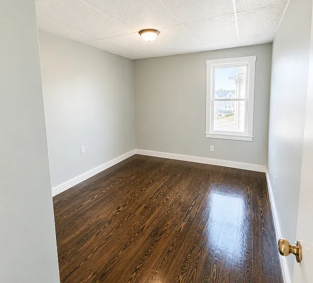 766 Plymouth Ave Fall River MA Spacious 3BR, 1BA w/ Large Master & Off Street Parking — Photo 10