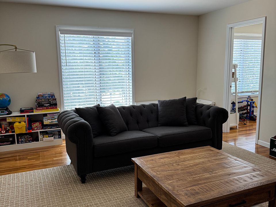 Living room facing towards study/office area