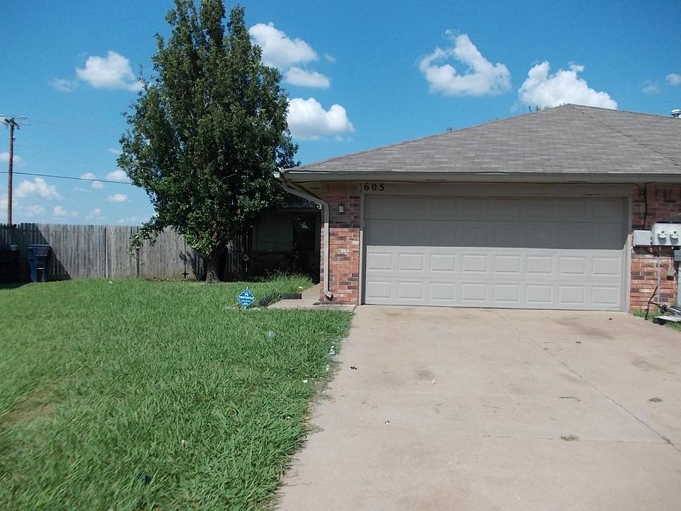 Driveway and front yard and garage door