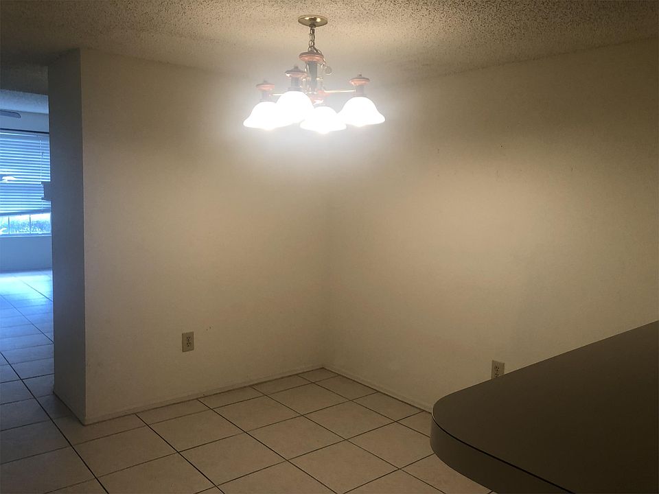 Dining room open to kitchen with breakfast bar