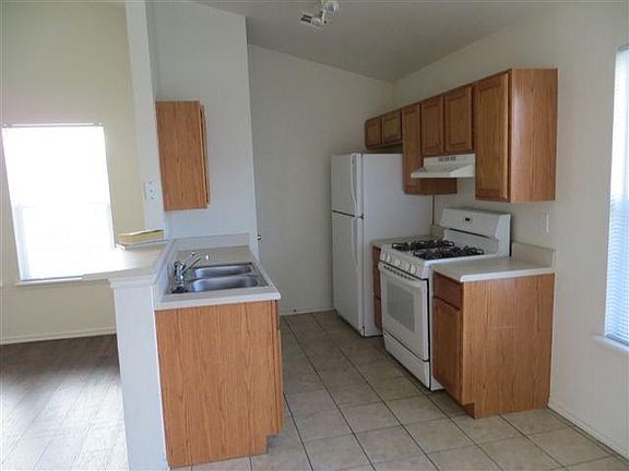 Kitchen opens into main family area.