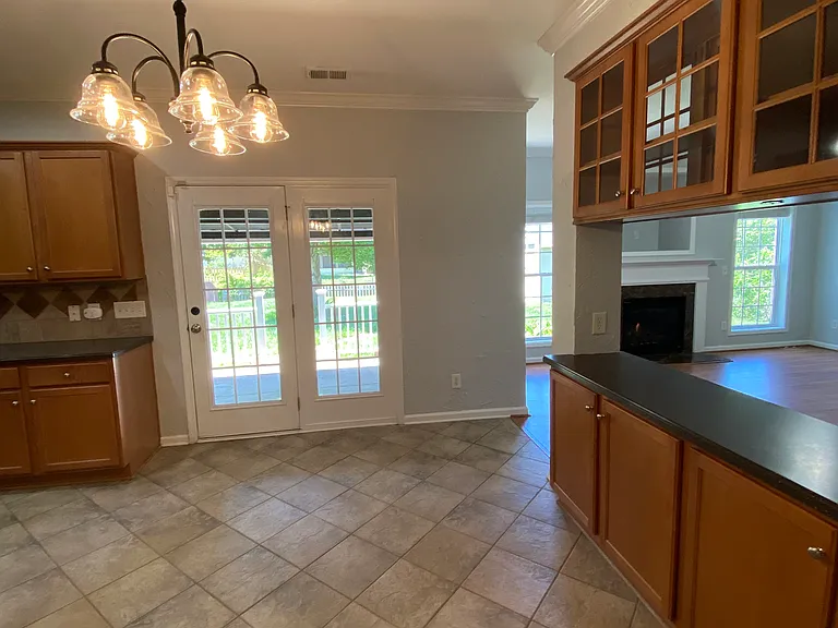The open floorpan allows for easy meandring between kitchen, living-room and outdoor spaces, perfect for entertaining.