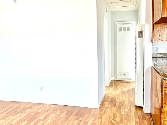 Hallway - Left is the bedroom and to the right is the bathroom