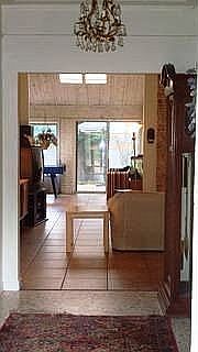 View from Front Door thru Family Room into Sun Room