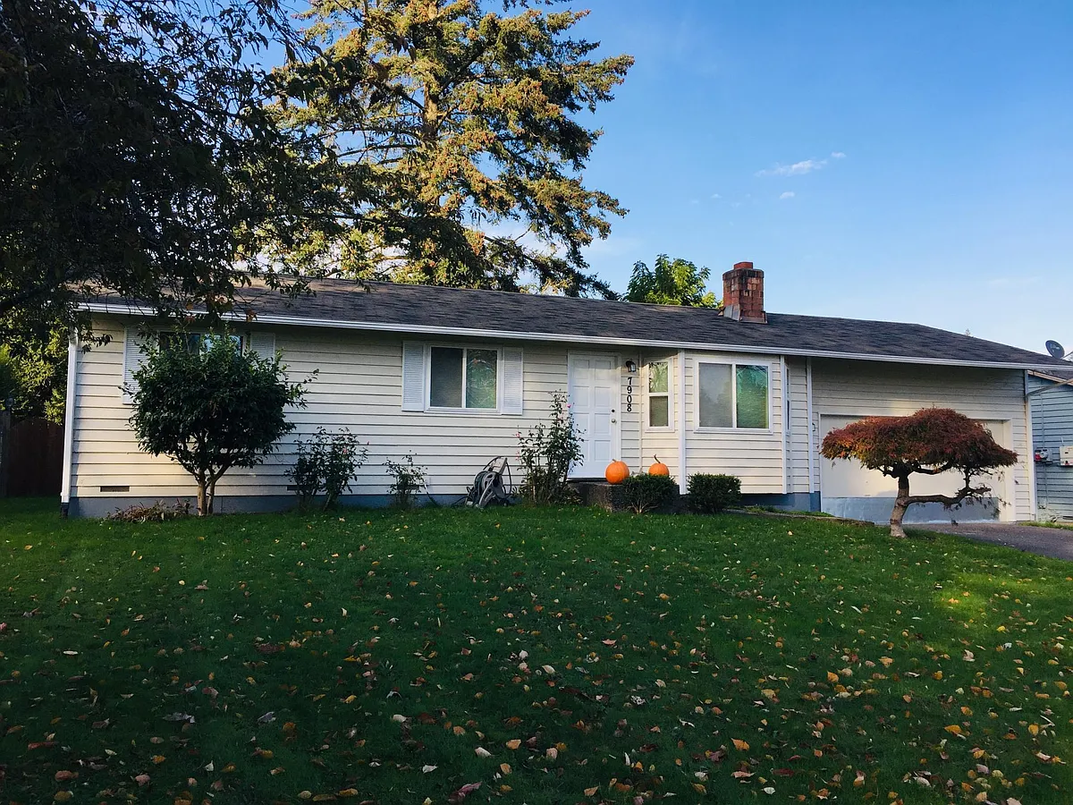 Front yard and 2-car attached garage with workbench - 7908 NE 143rd St