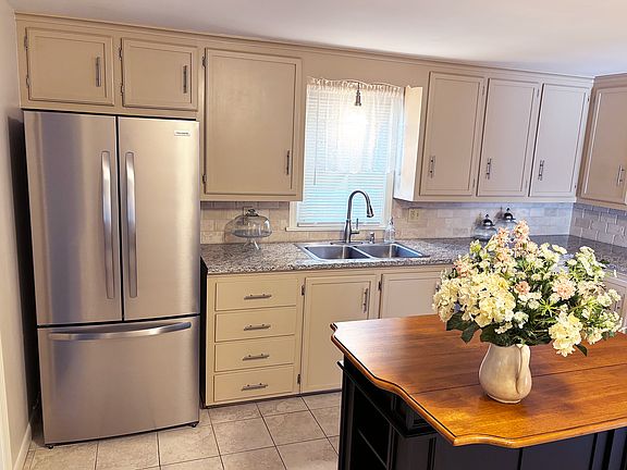 New Granite & Travertine Kitchen with all New Stainless Appliances