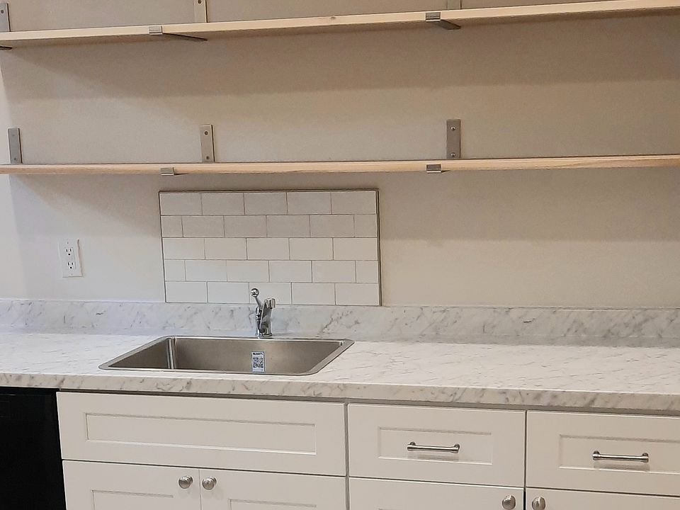 Opening shelving over sink w/ Italian tile backsplash