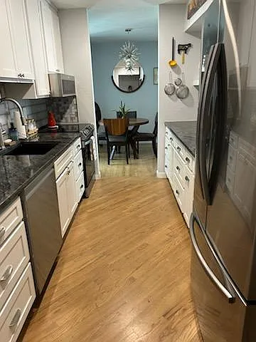 Smart appliances. French door refrigerator/freezer with in door filtered water and ice