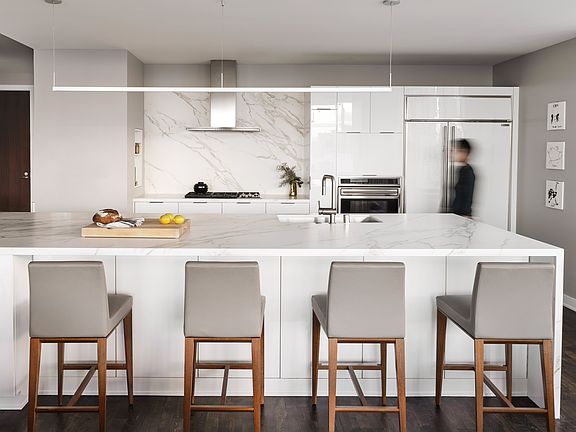 Remodeled kitchen with large island and lots of smart storage
