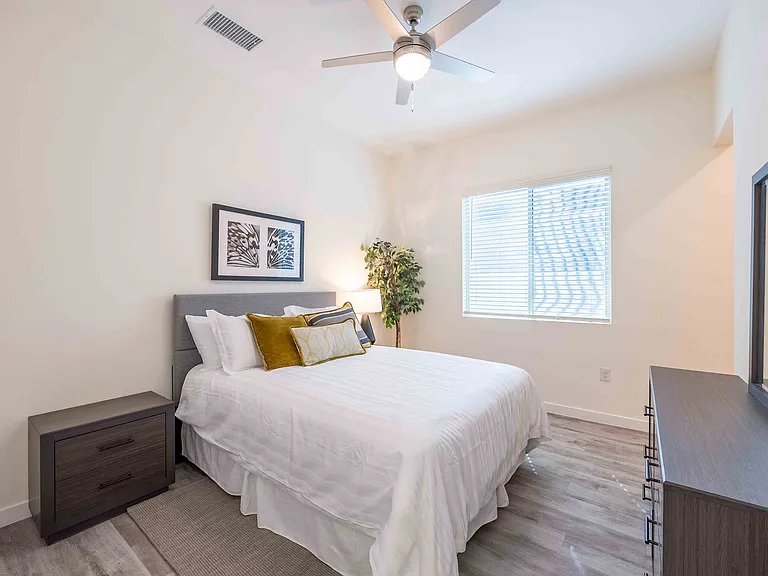 Experience ultimate relaxation in this beautifully designed bedroom retreat.
