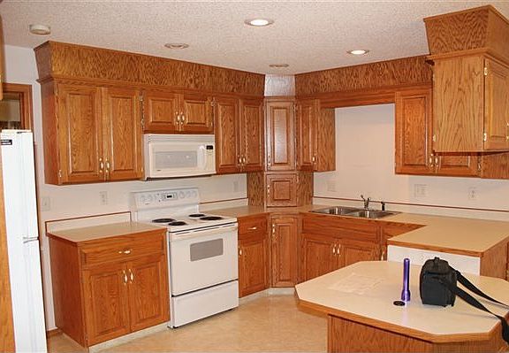 View of Kitchen, oak cupboards, dura ceramic floor