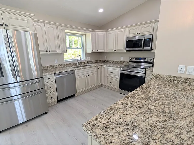 7708 N Paris Dr — Photo 7