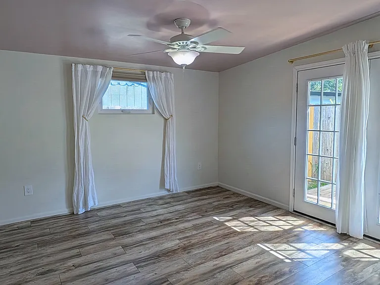 Another view of the bedroom in brighter light.