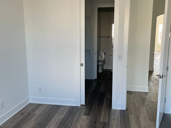 Bedroom 2 includes a walk in closet directly into bath and powder that can be closed off or open to guests.