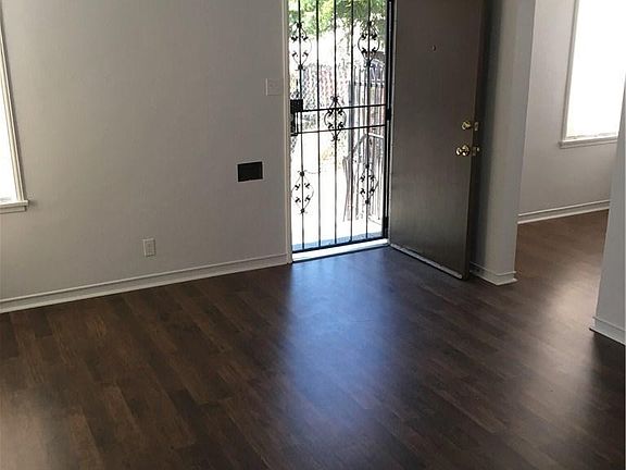 Front door opens into living room. Dining nook is next room over.
