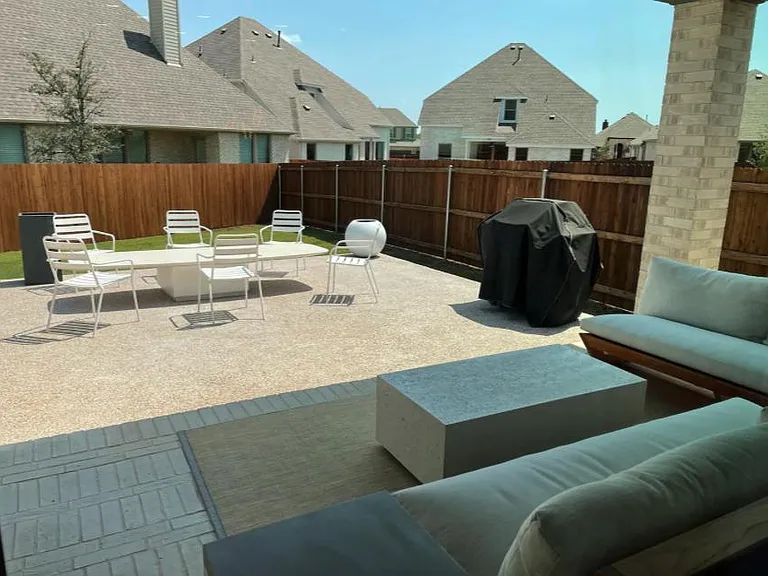 Backyard with plenty of sitting area and BBQ Grill