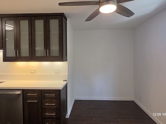 Dining area with ceiling light & fan